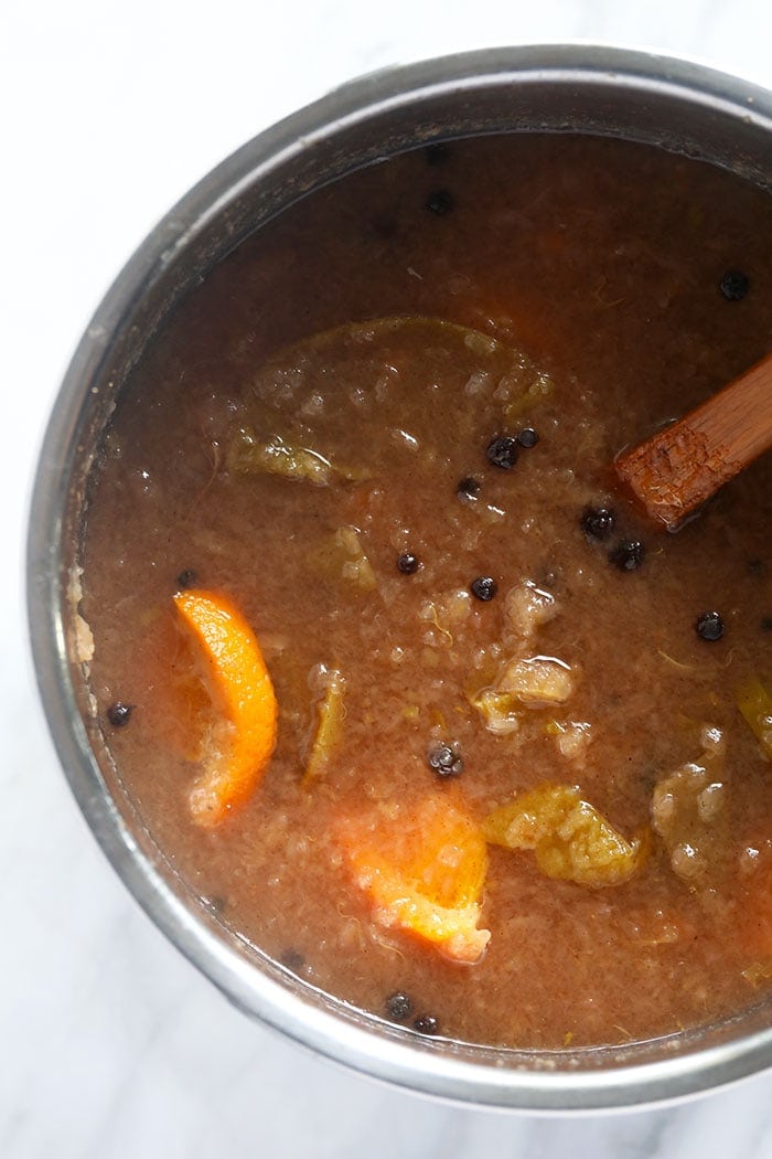 Apple cider ingredients mashed in the Instant Pot