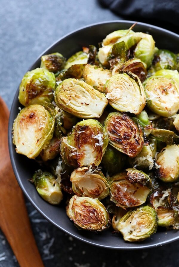 Roasted Brussels sprouts with parmesan served in a bowl.