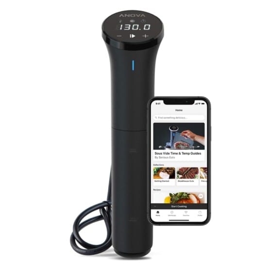 A smartphone with a food thermometer next to it used for sous vide pork tenderloin.