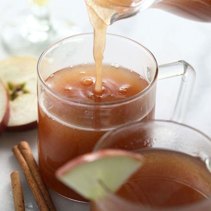 spiked apple cider in a glass mug