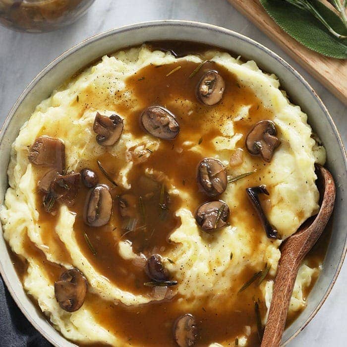 Vegan mashed potatoes with mushroom gravy.