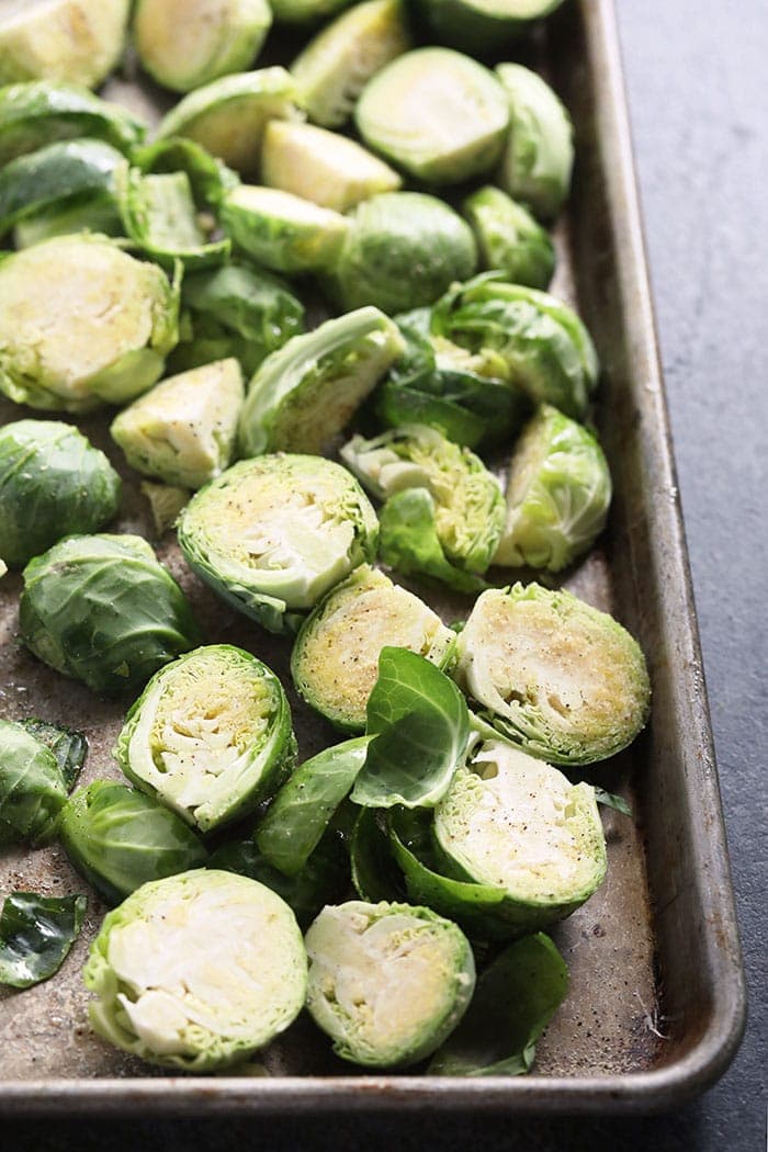 Fresh brussel sprouts on a baking sheet