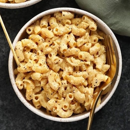 Two bowls of vegan mac and cheese.