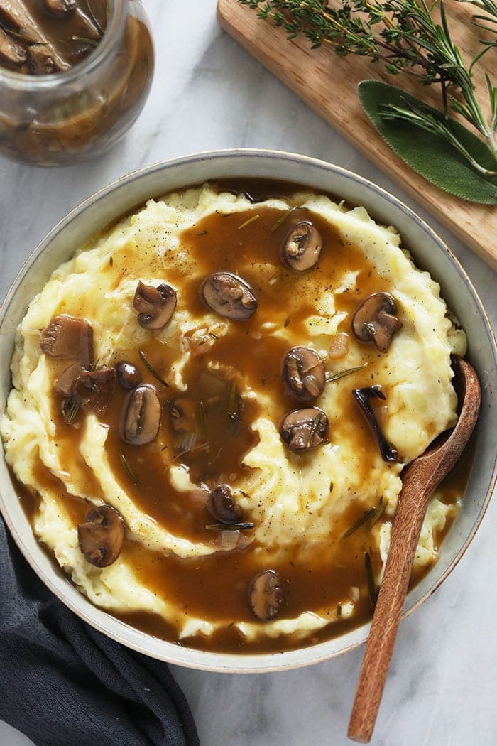 Vegetarian Mushroom Gravy over mashed potatoes in a bowl 