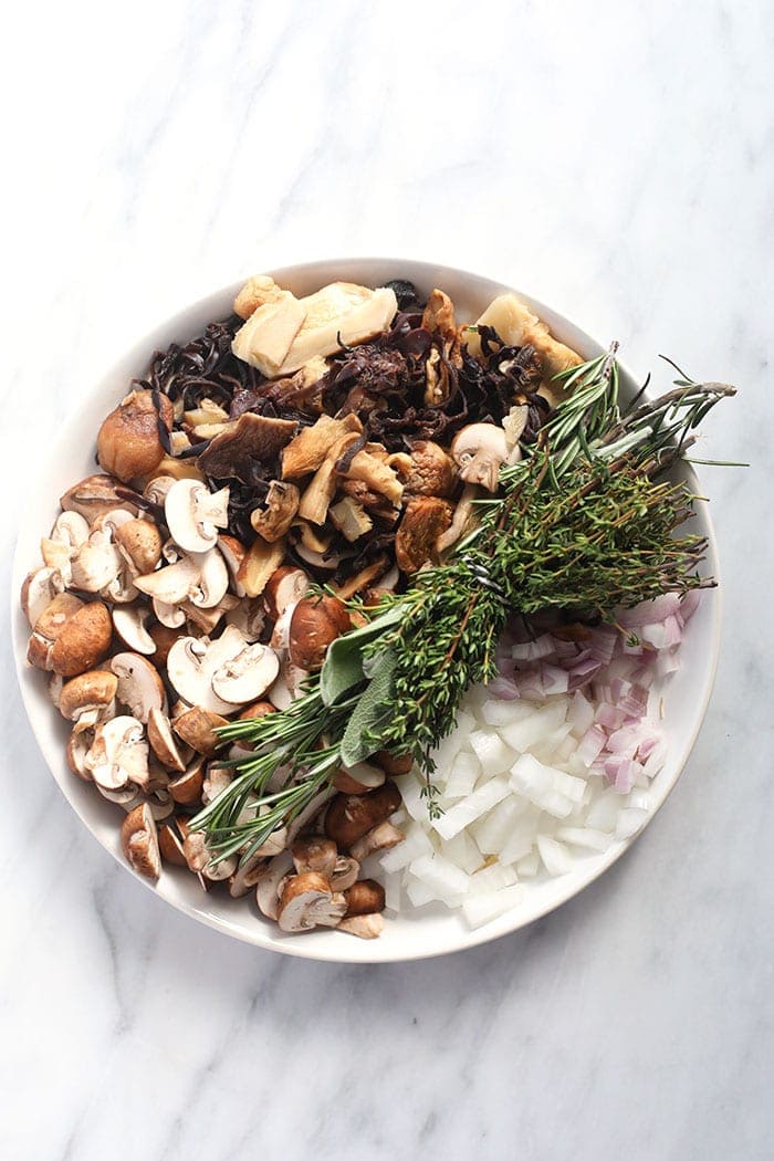 Ingredients for the mushroom gravy on a plate.