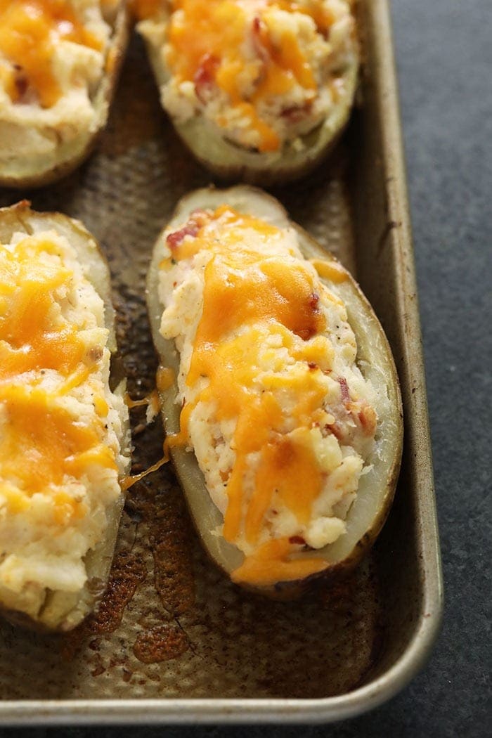 twice baked potatoes topped with cheese