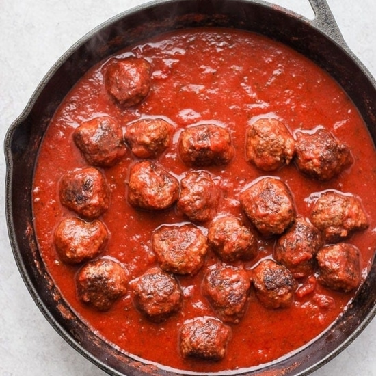Meatballs and sauce in a pan.