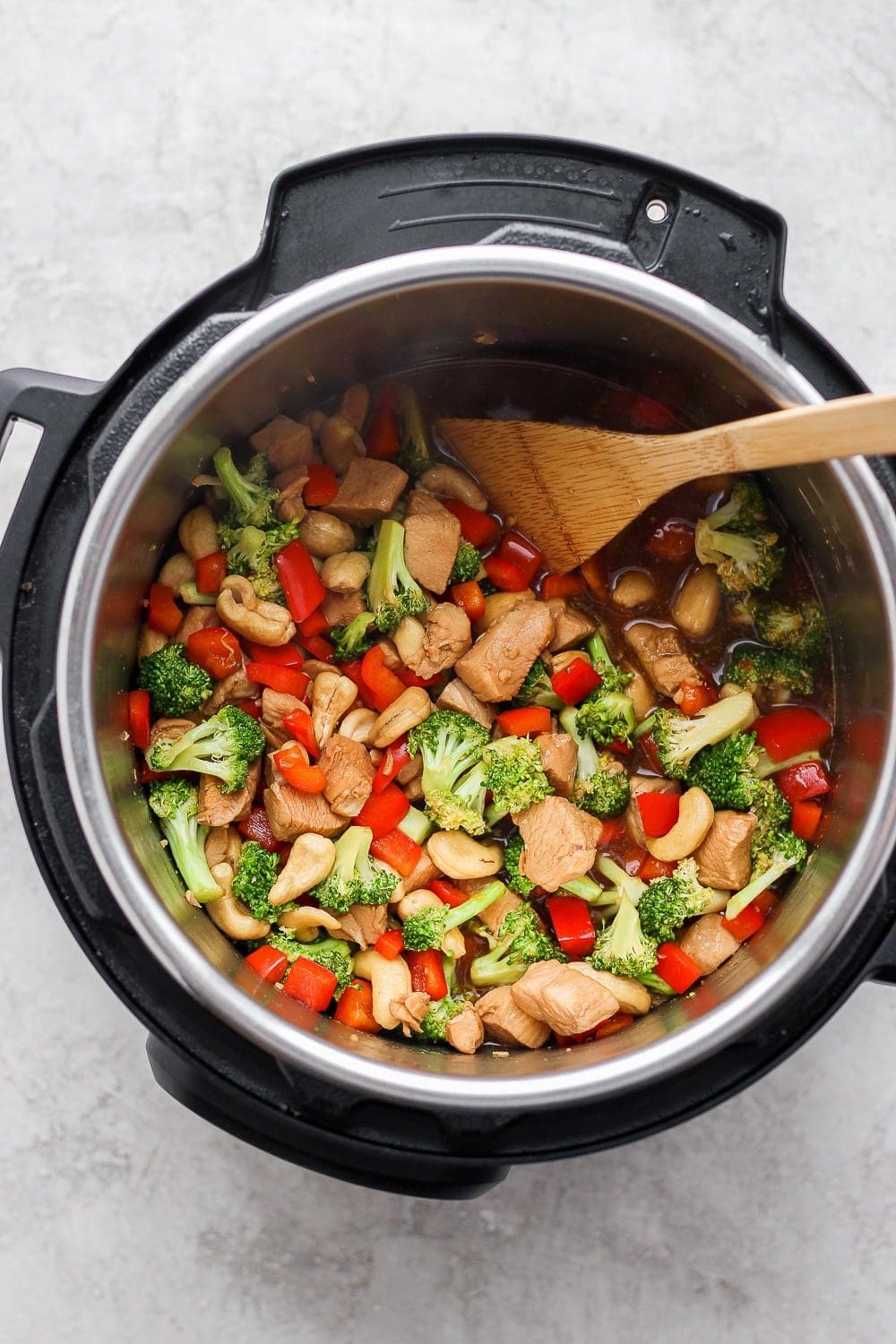 instant pot cashew chicken being cooked in the instant pot