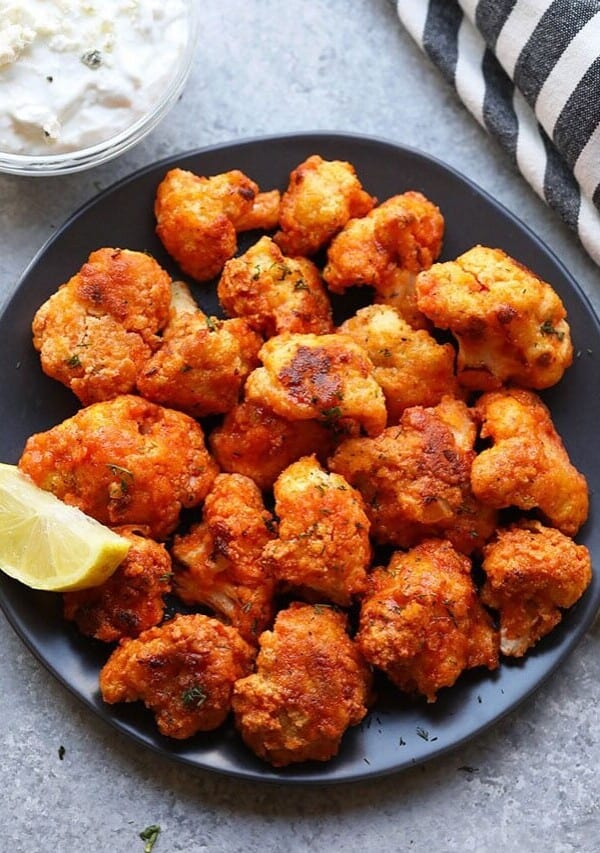 a plate of buffalo cauliflower wings