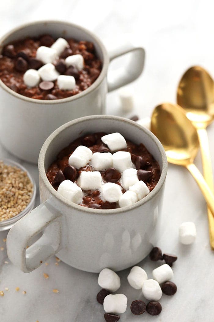 hot cocoa steel cut oats in mugs ready to be served