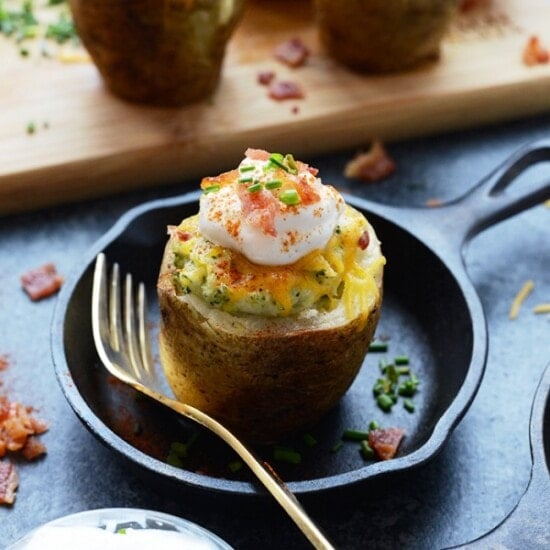 Keywords: Twice Baked Potatoes, Bacon

Twice-baked stuffed potatoes with bacon and sour cream cooked in a skillet.