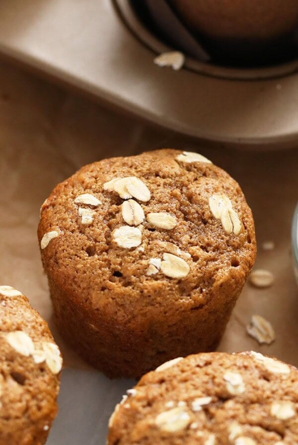 classic oatmeal muffins topped with rolled oats