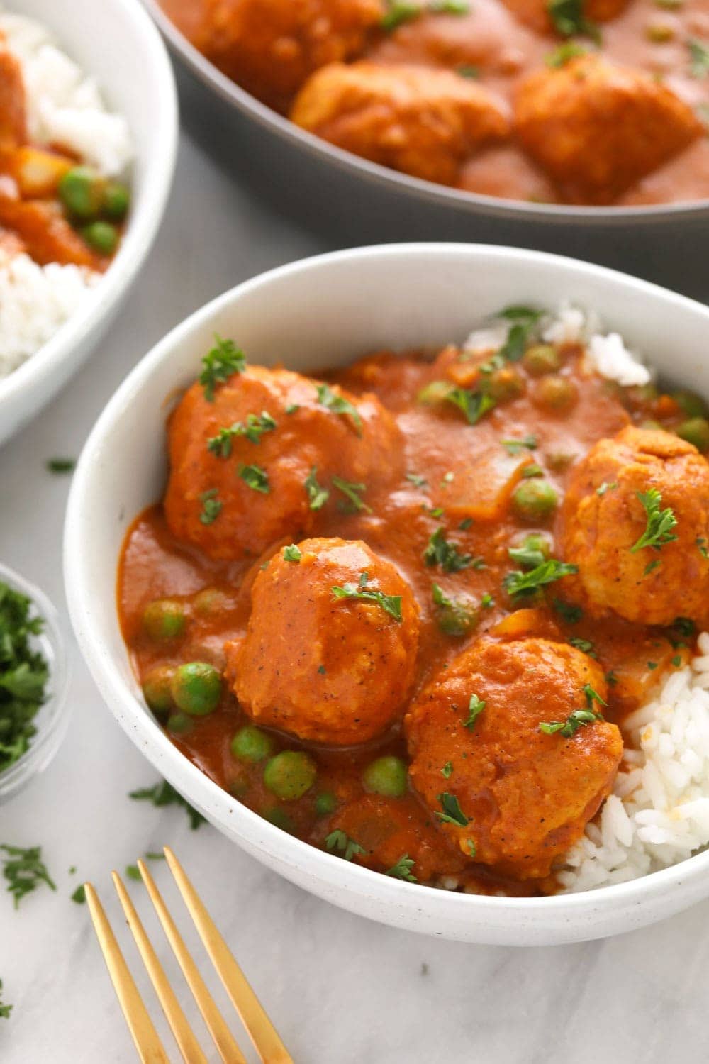 Tikka masala meatballs over rice