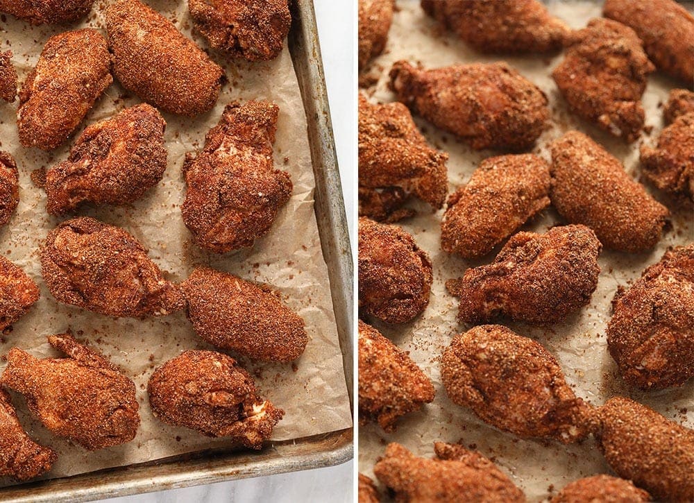 Dry rub wings on a baking sheet