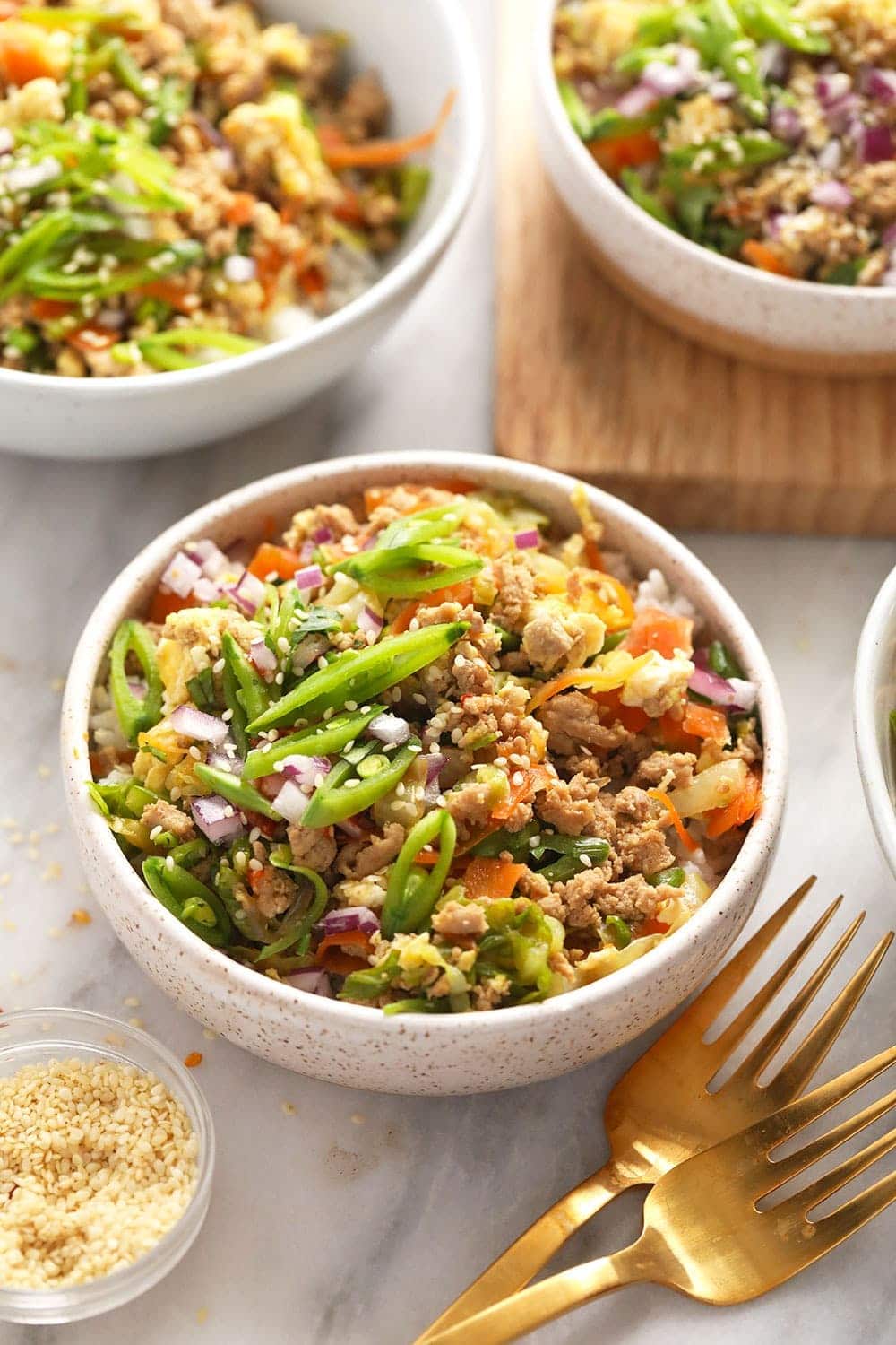 egg roll in a bowl served with rice 