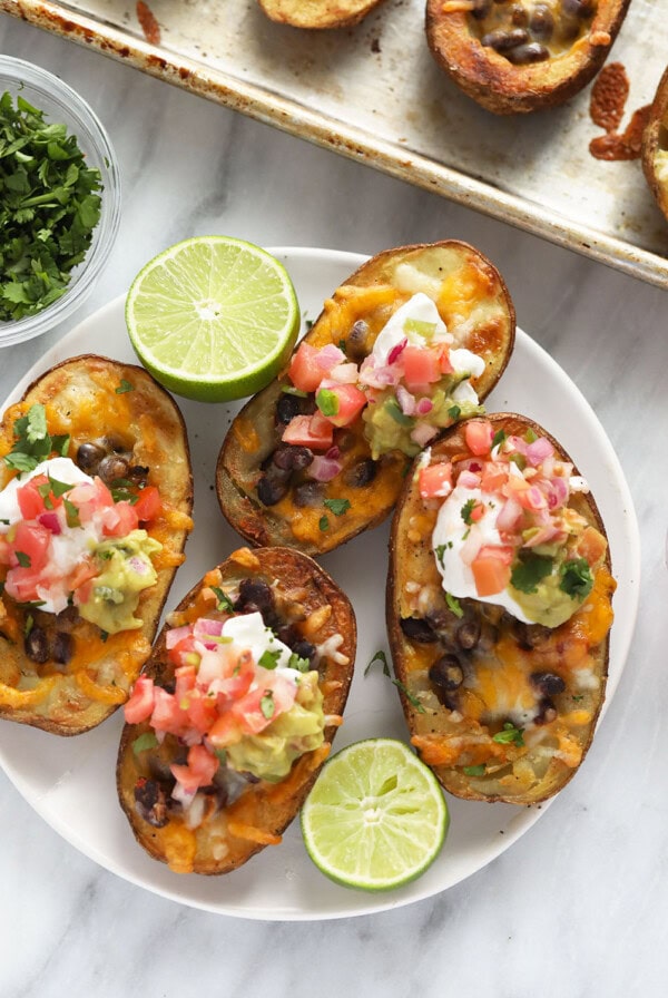 Mexican potato skins smothered with guacamole and sour cream.