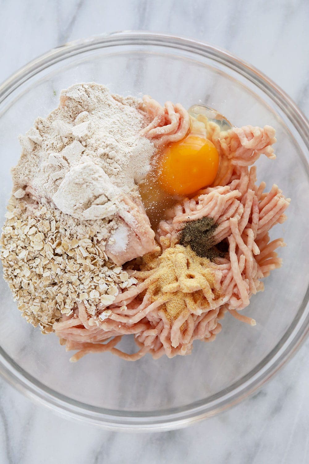 Ingredients for tikka meatballs in a bowl