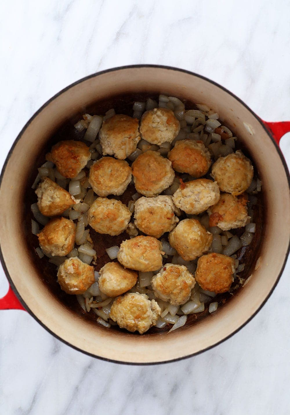 Browning meatballs in a dutch oven