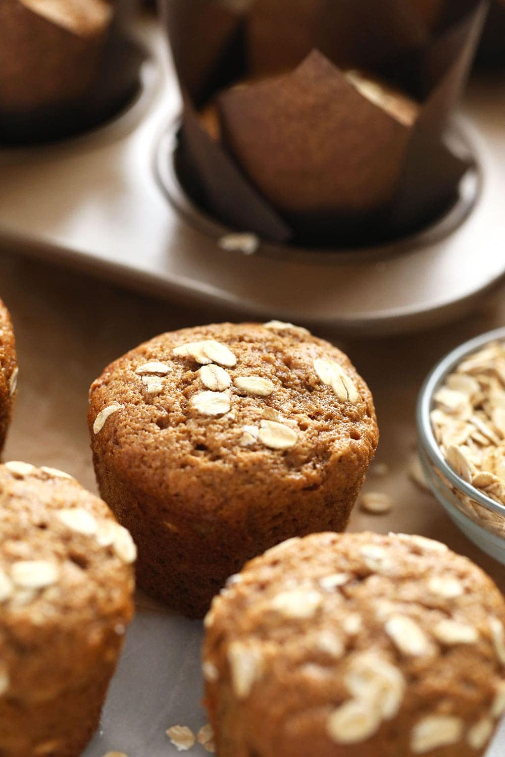 classic oatmeal muffins topped with rolled oats