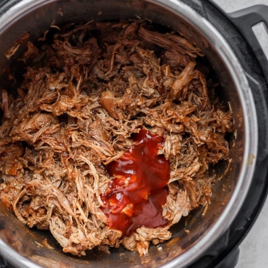 bbq sauce on pulled pork in Instant Pot.
