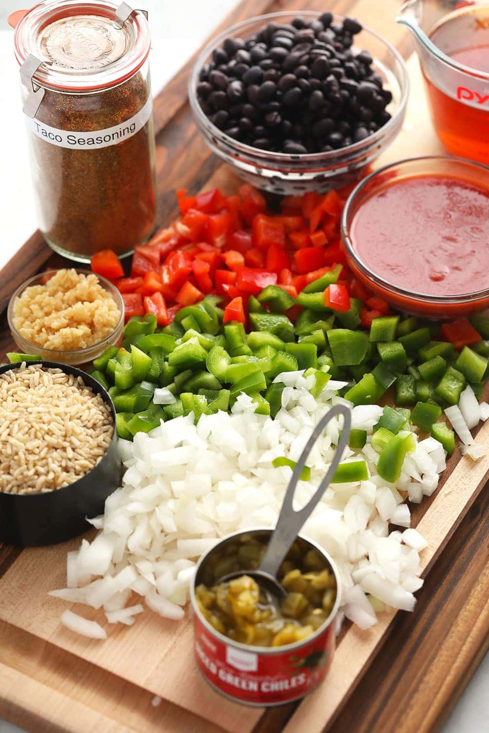 ground beef skillet ingredients on cutting board.