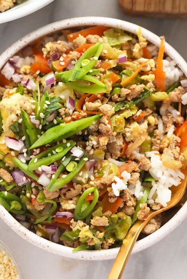 egg roll in a bowl served with rice
