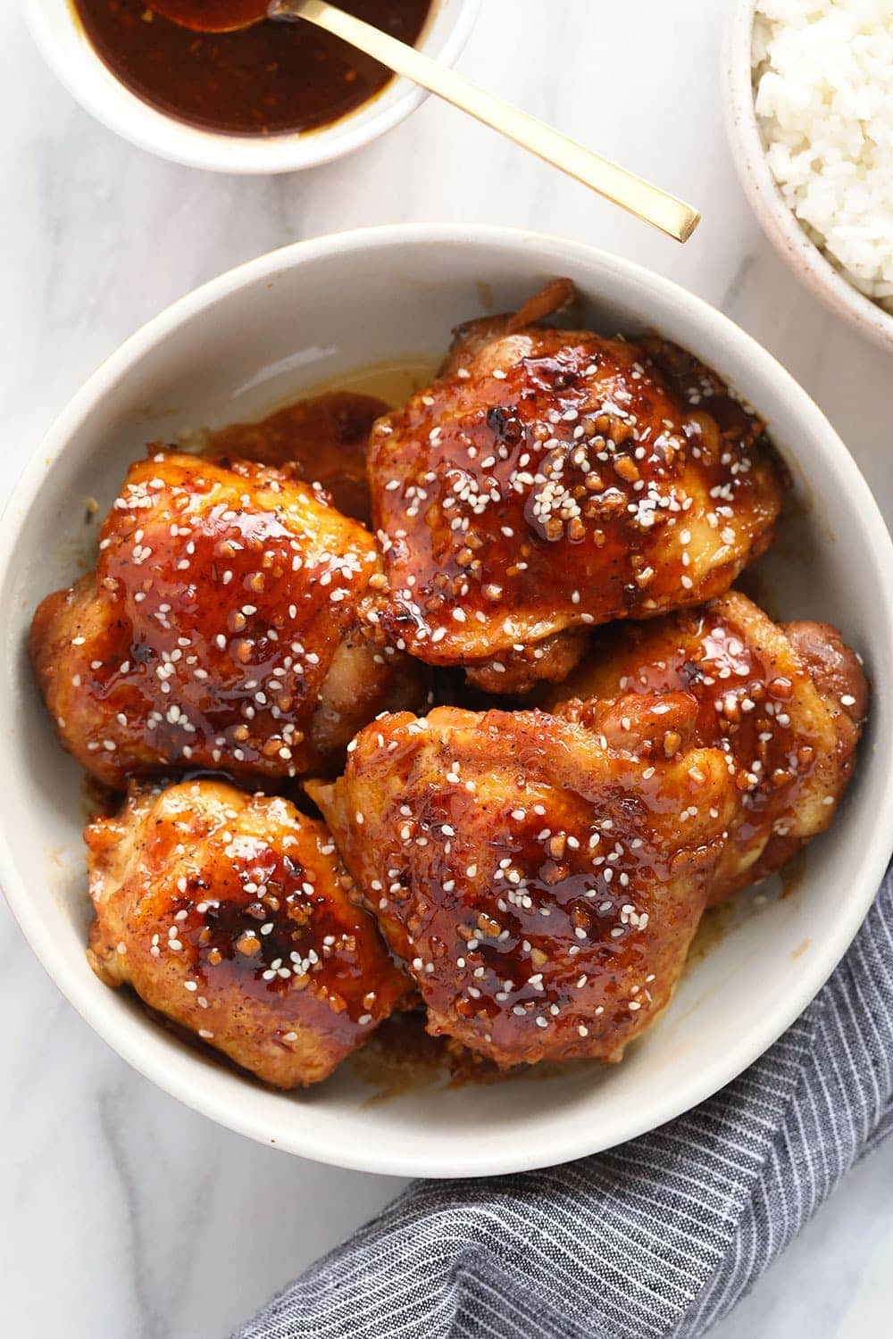 honey garlic chicken thighs in bowl.