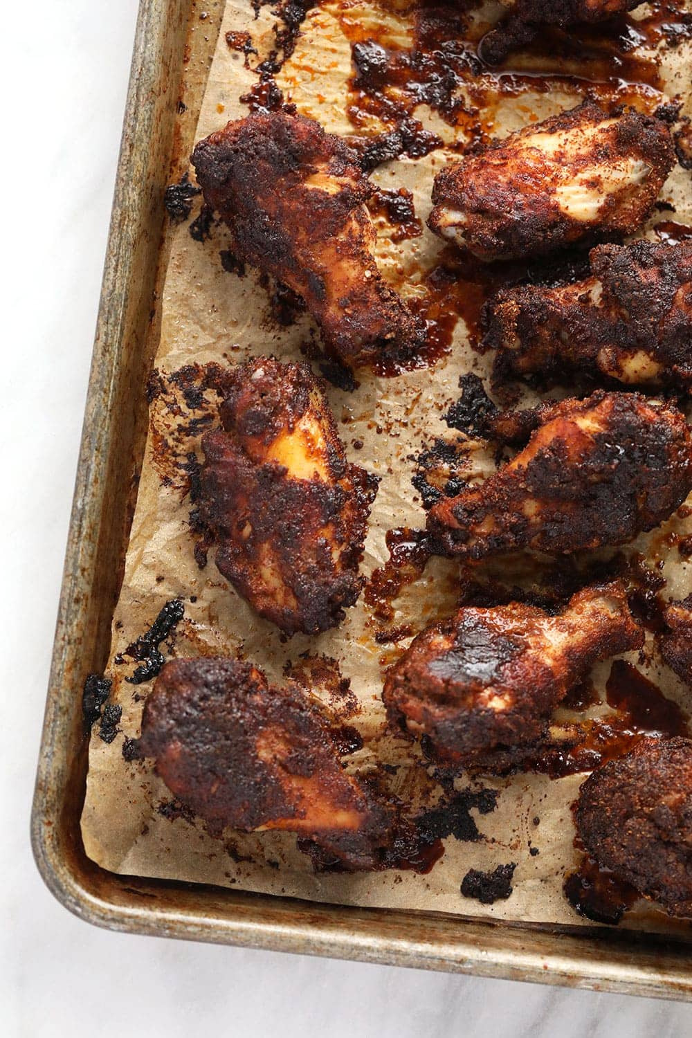 Dry rub chicken wings after they are baked