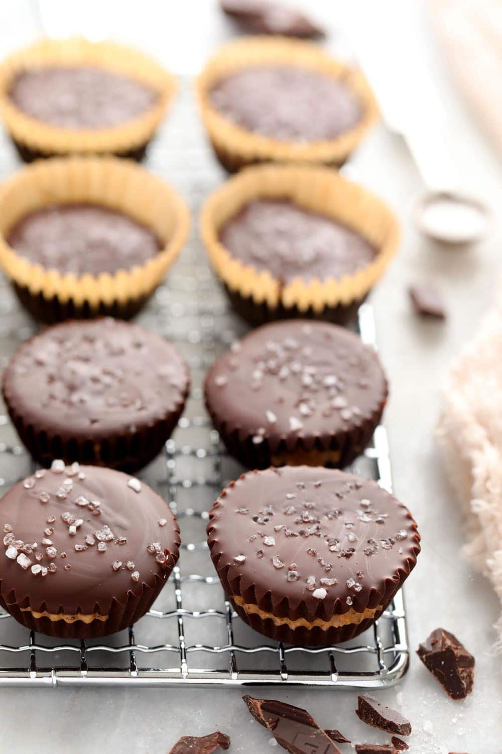 almond butter cups on metal rack
