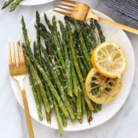 Asparagus on plate with lemon