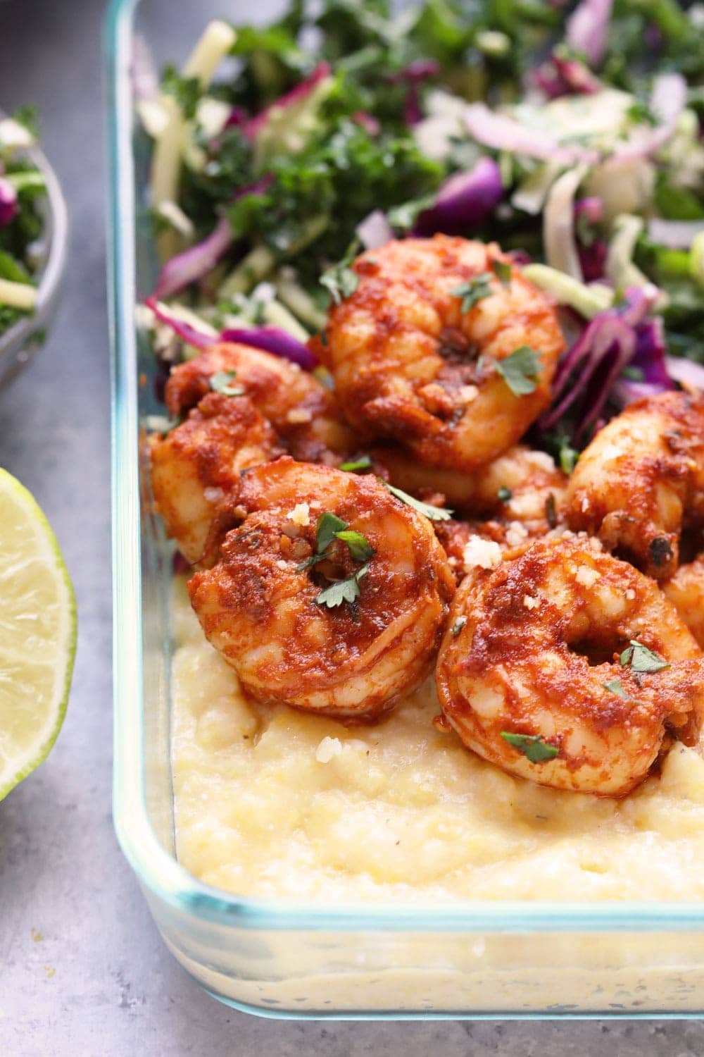 Cajun Shrimp and Grits in a meal prep container