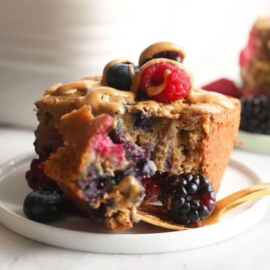 a close up of Triple berry breakfast bread on a plate.