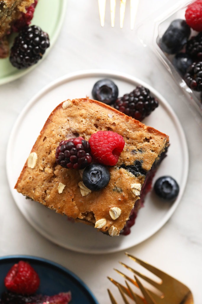 Triple berry breakfast bread on a plate.