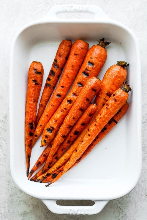 Grilled carrots in a dish.
