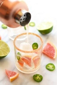 A zesty glass of grapefruit margarita with a hint of jalapenos.