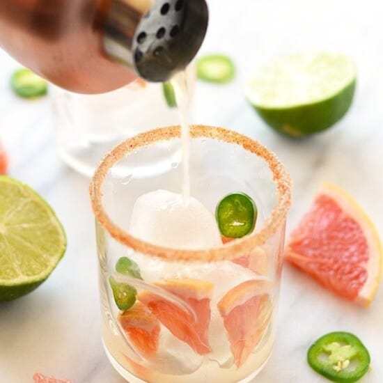 A zesty glass of grapefruit margarita with a hint of jalapenos.