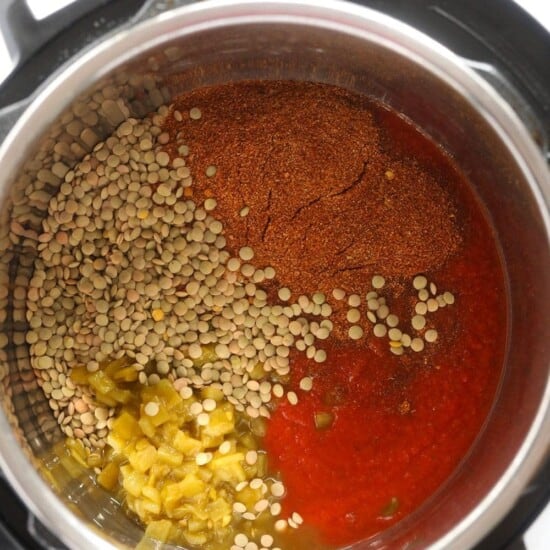 An Instant Pot filled with lentils and spices for making delicious lentil tacos.