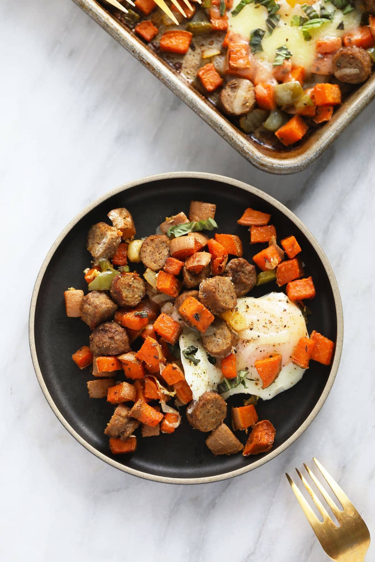 sweet potato hash with a baked egg on a plate