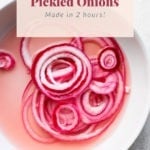 Quick pickled onions in a bowl.