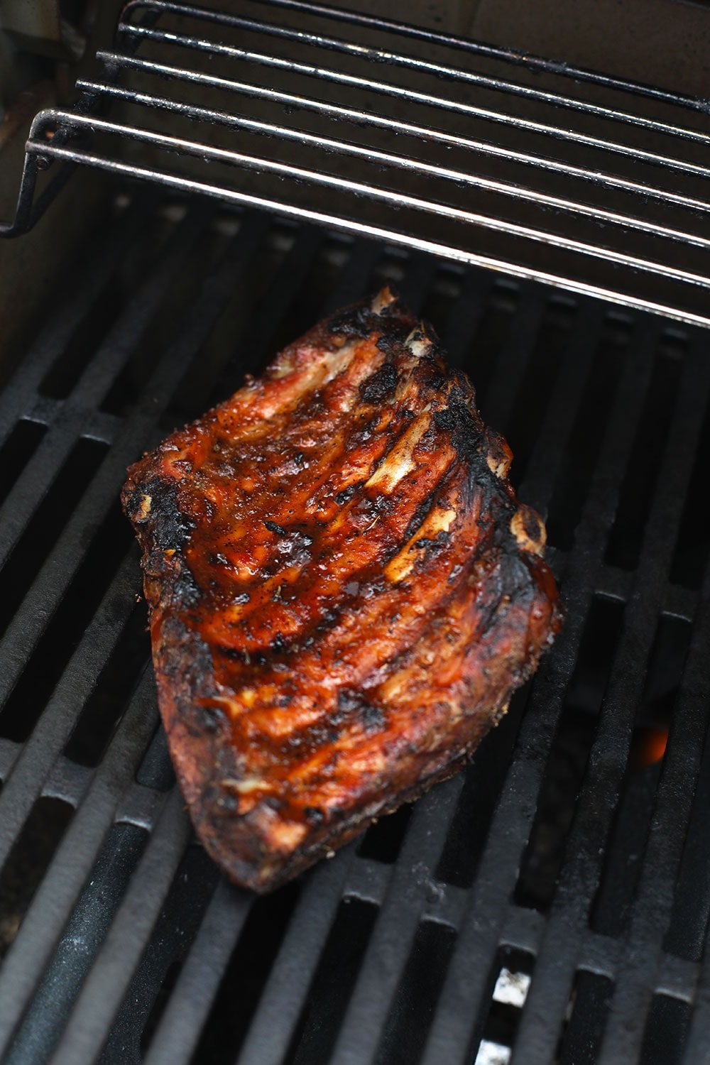 Sous vide ribs caramelizing on the grill