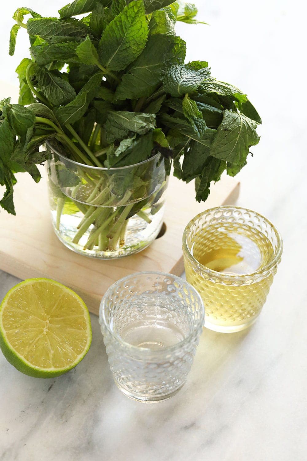 fresh mint, simple syrup, rum, and lime