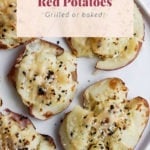 Smashed garlic red potatoes on a plate