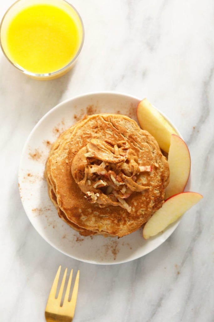 Pancakes on plate with nuts.