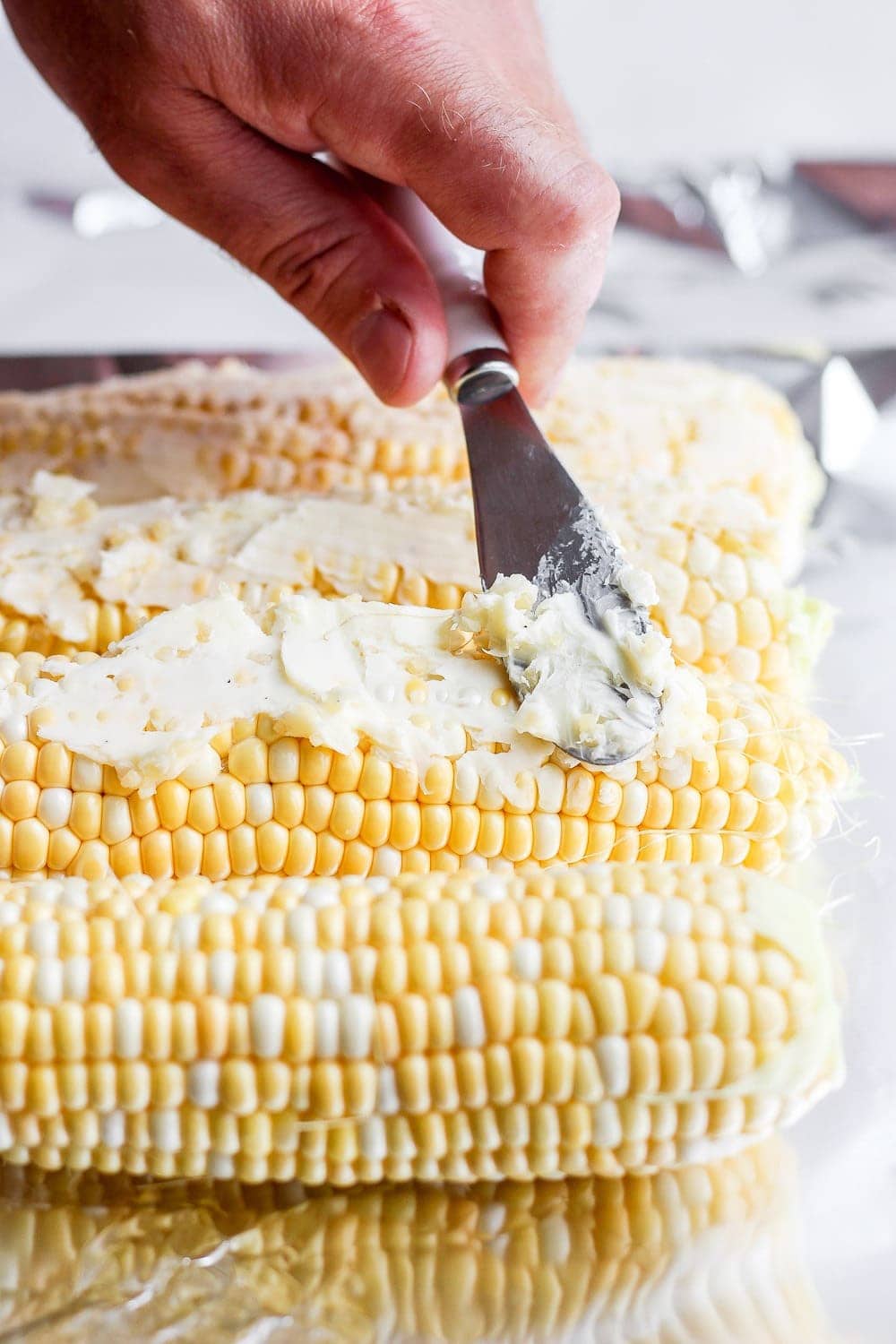 https://fitfoodiefinds.com/wp-content/uploads/2020/07/corn-in-foil-6.jpg