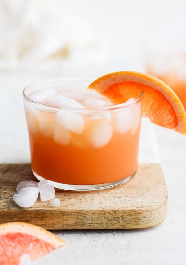 a glass of paloma grapefruit cocktail