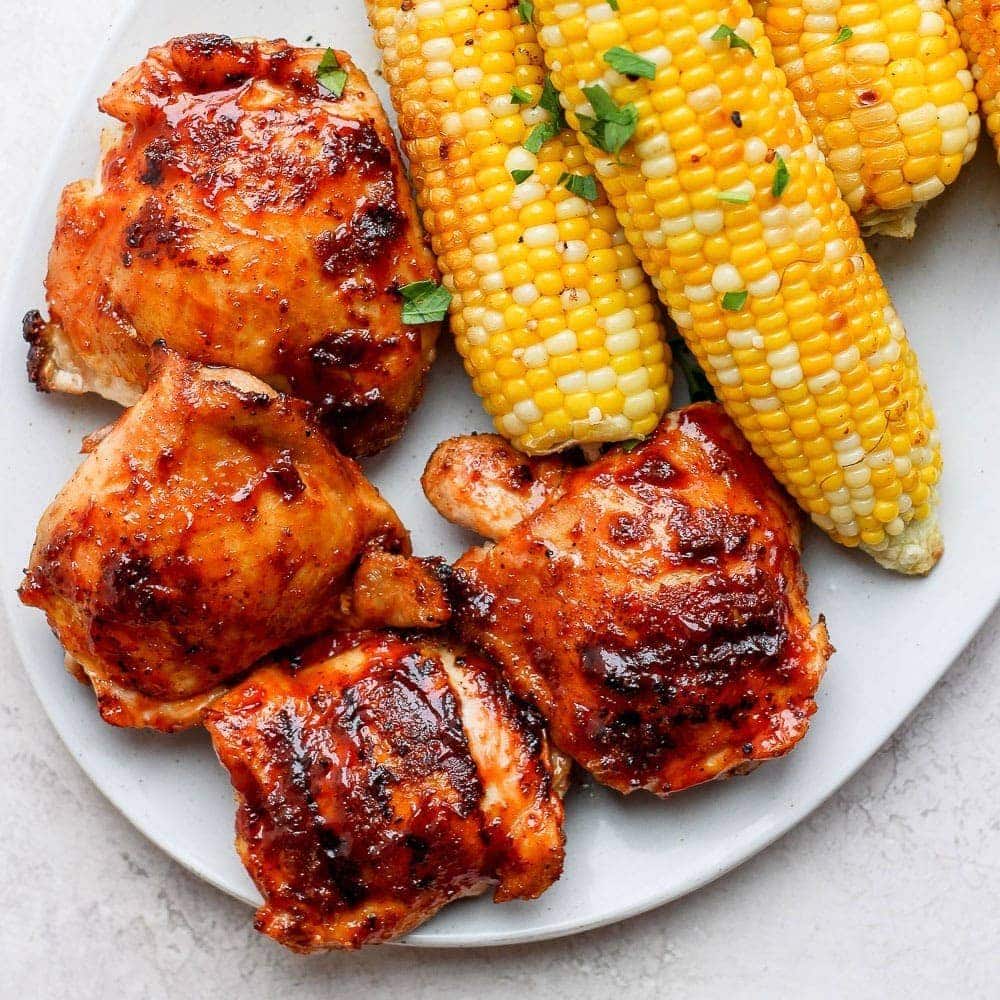 grilled chicken thighs on plate