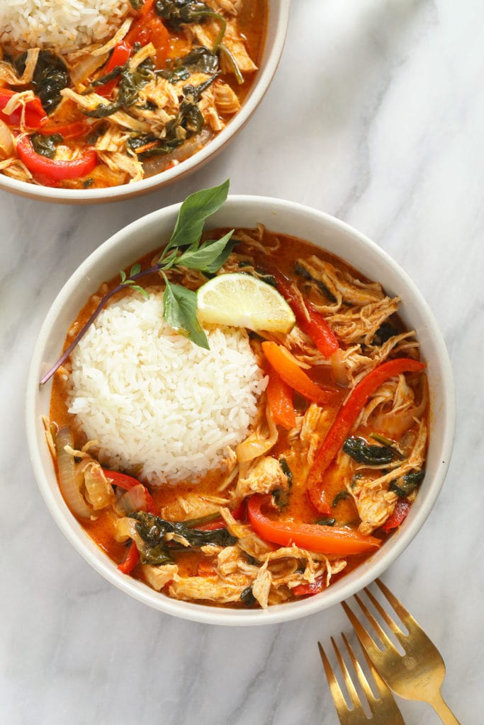 bowl of Thai red coconut curry chicken with white rice