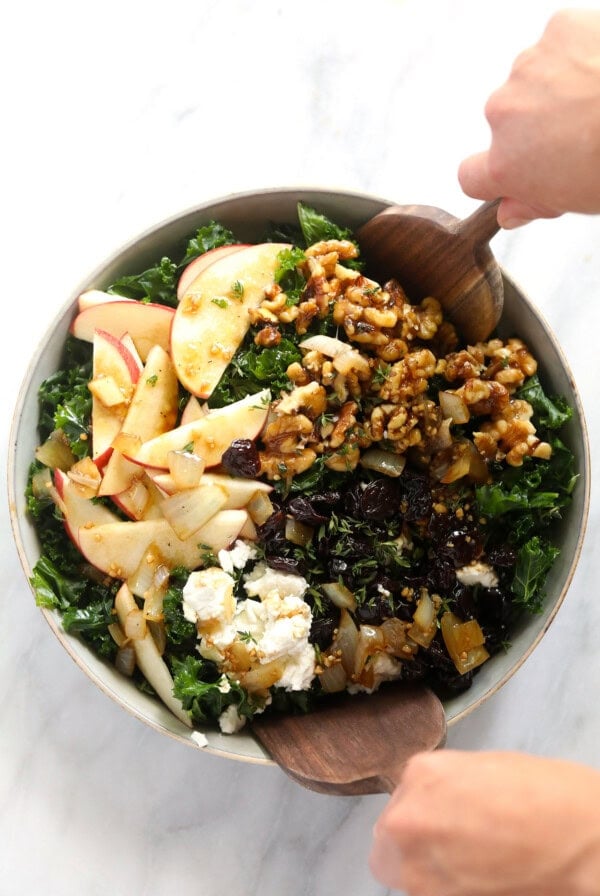 a Thanksgiving salad with kale, apples, and walnuts.
