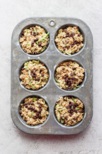 oatmeal muffins in a muffin tin.