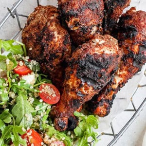 grilled chicken legs with a kale salad